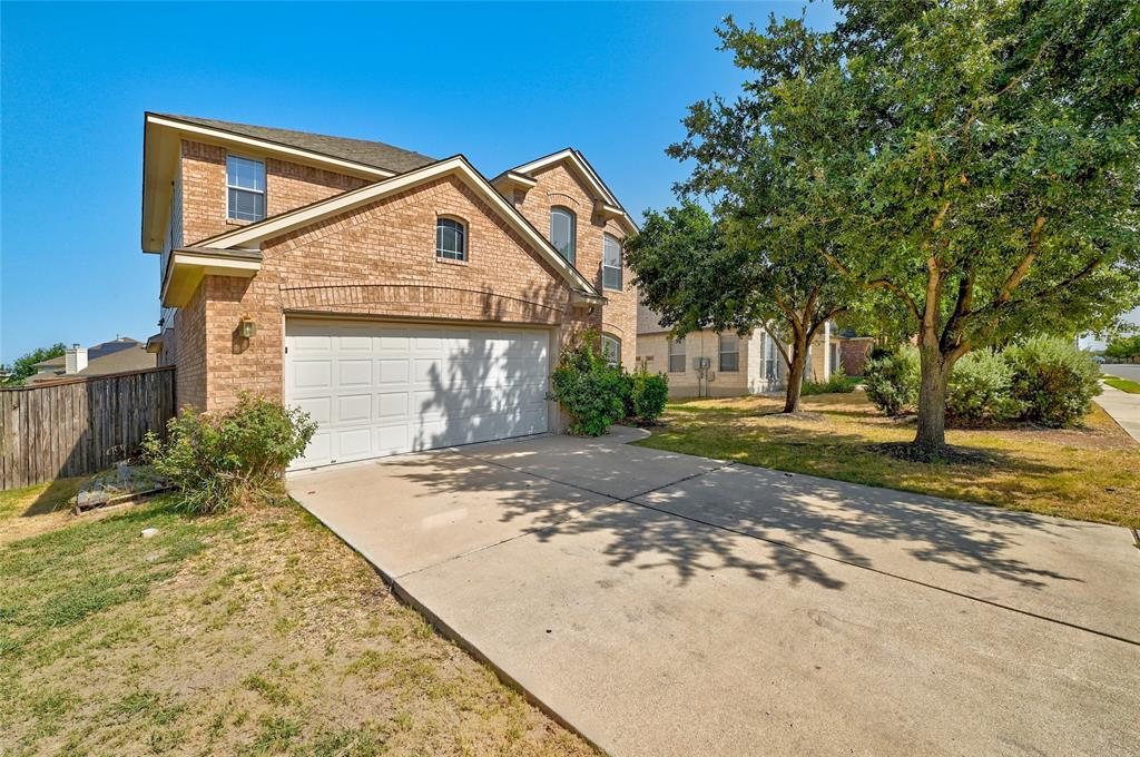 3664 Rosalina Loop Round Rock, TX 78665 - Photo 2 of 22 a view of a house with a yard