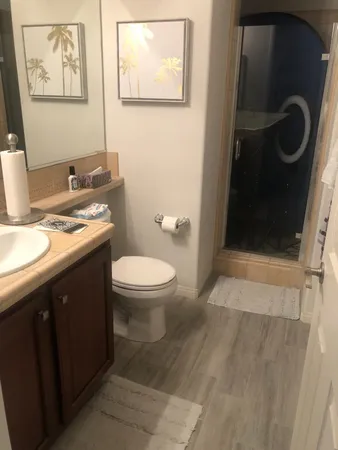 a outdoor living space with furniture and a potted plant