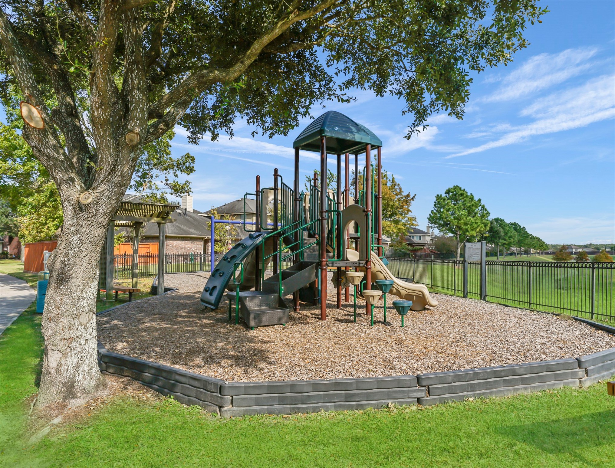 8214 Garrison Point Drive Houston, TX 77040 - Photo 33 of 37 a park view with a tree
