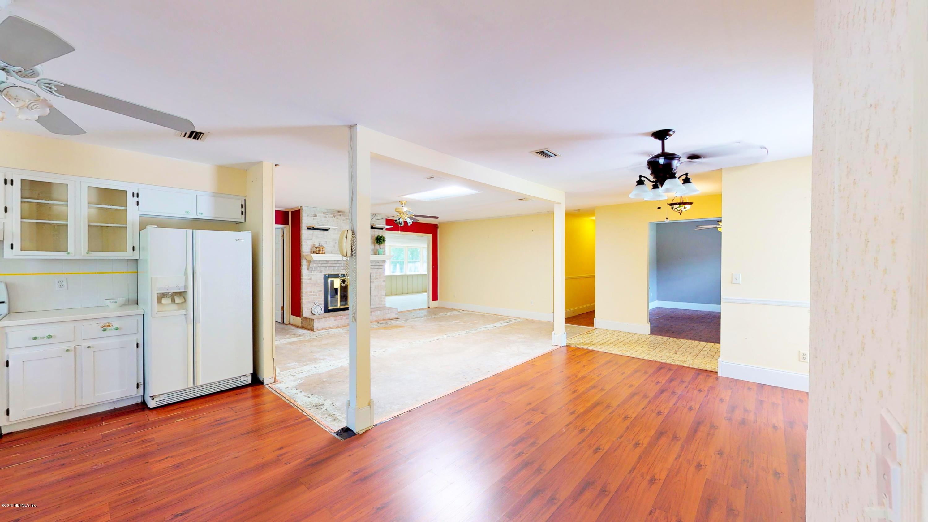 2980 Oak Road Orange Park, FL 32065 - Photo 7 of 37 Kitchen to Living Room