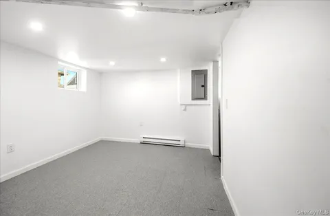 an empty room with a bathroom