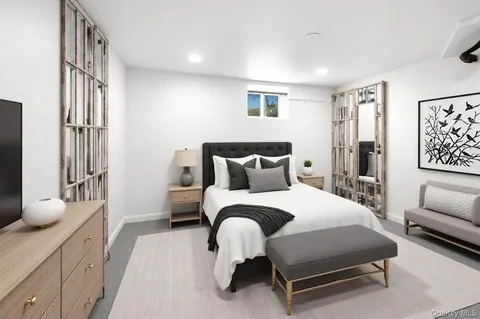 a bedroom with a bed and furniture