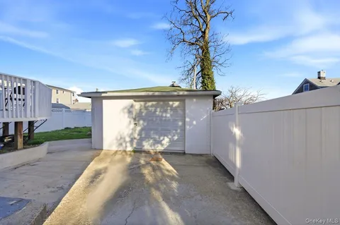 a view of backyard of a house