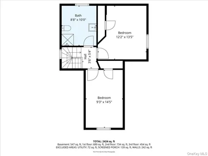 a picture of a bench in front of a wall