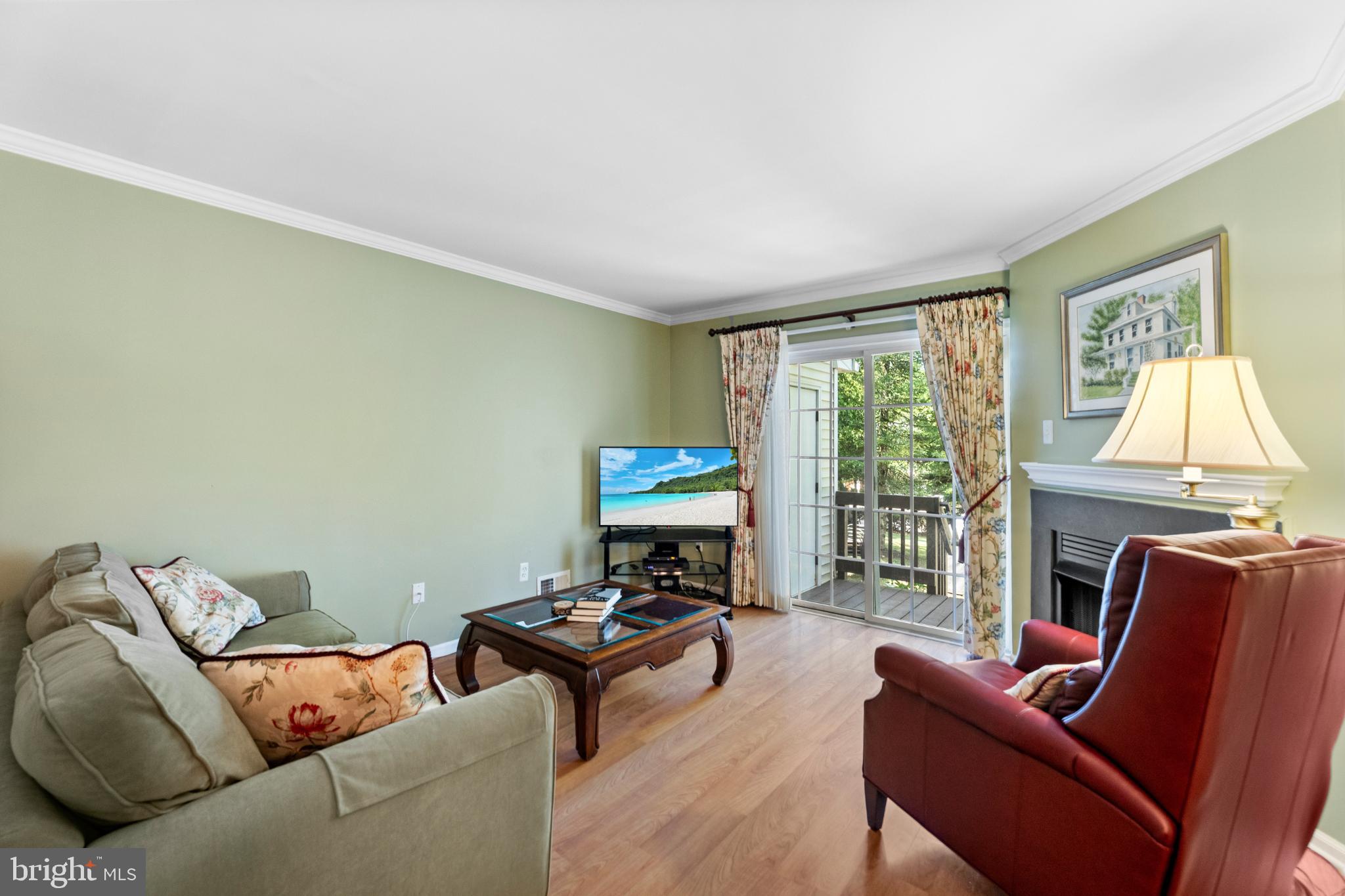 28 Garfield Way Princeton, NJ 08540 - Photo 12 of 38 a living room with furniture and a fireplace