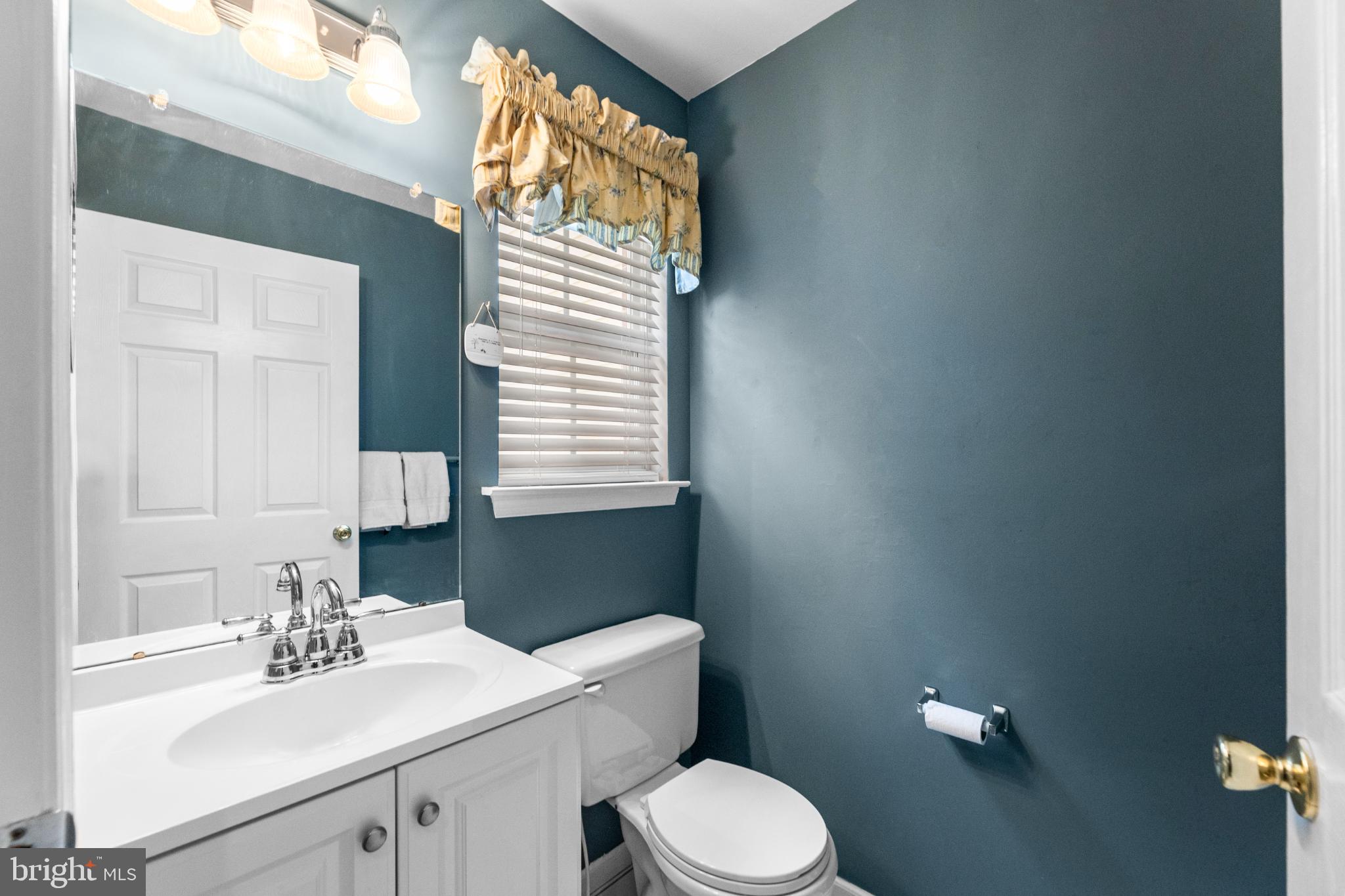 28 Garfield Way Princeton, NJ 08540 - Photo 20 of 38 a bathroom with a sink vanity mirror and toilet