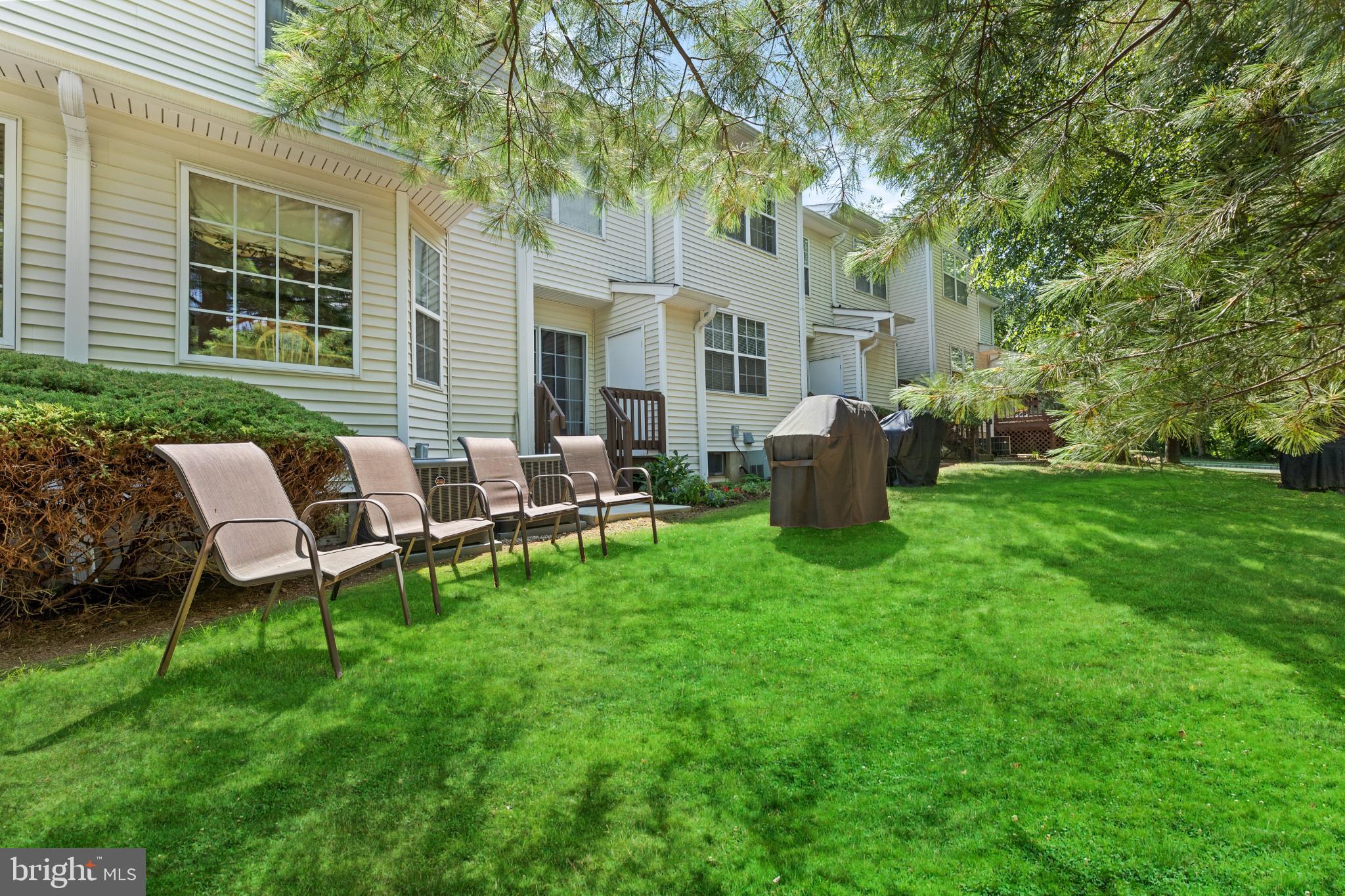 28 Garfield Way Princeton, NJ 08540 - Photo 24 of 38 a view of a house with backyard sitting area and garden