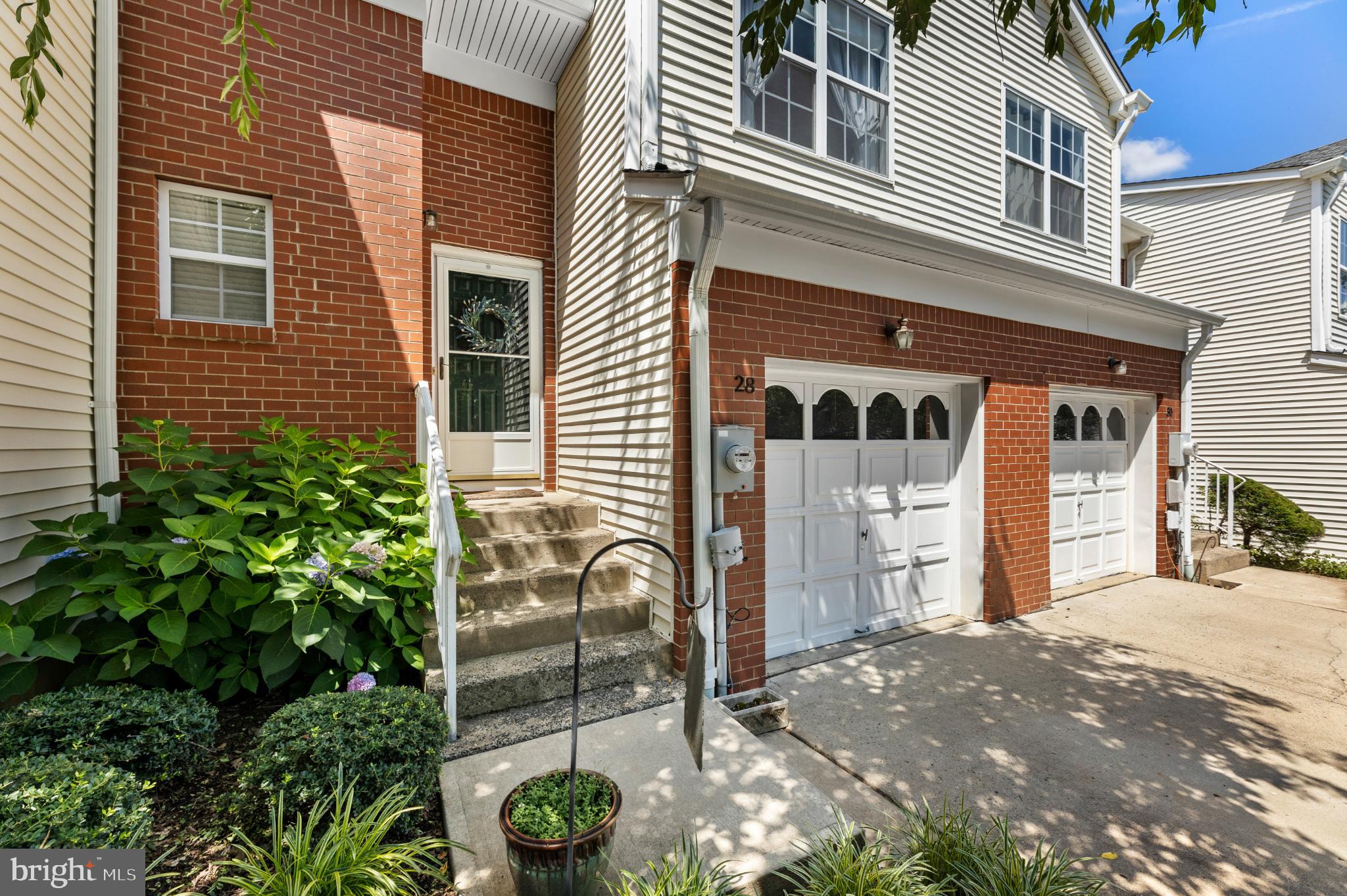 28 Garfield Way Princeton, NJ 08540 - Photo 26 of 38 a front view of a house with garden