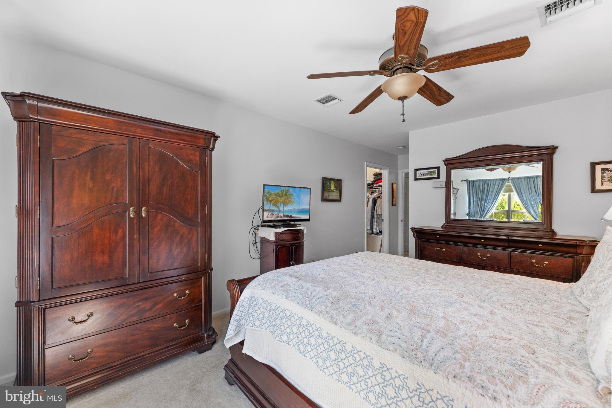 28 Garfield Way Princeton, NJ 08540 - Photo 4 of 38 a bedroom with a bed and a dresser