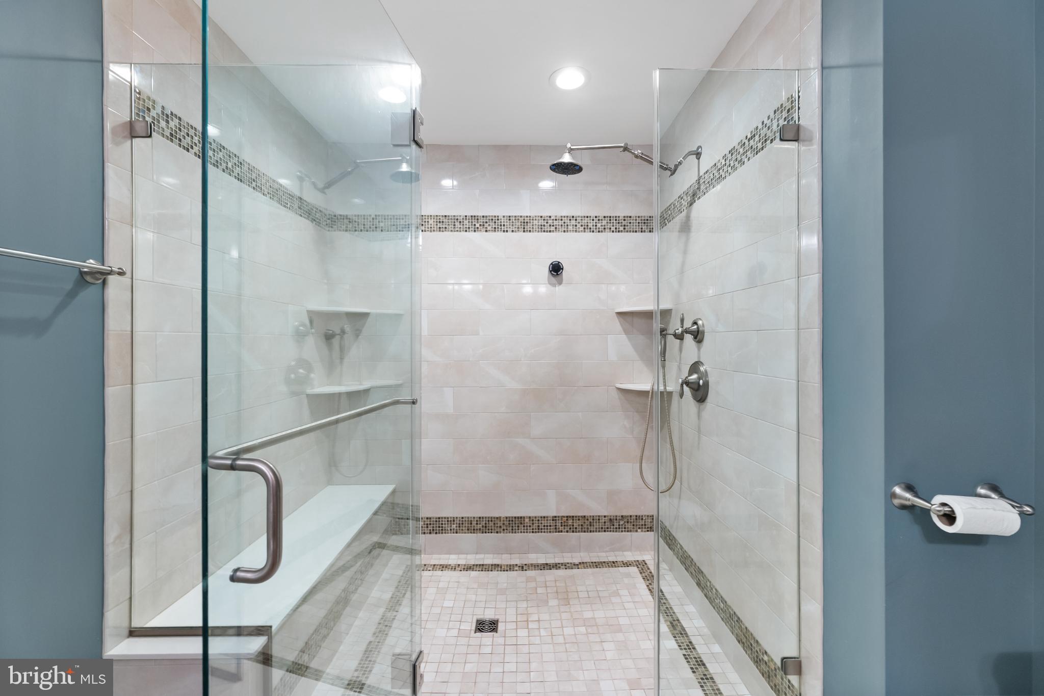 28 Garfield Way Princeton, NJ 08540 - Photo 5 of 38 a bathroom with a glass shower door