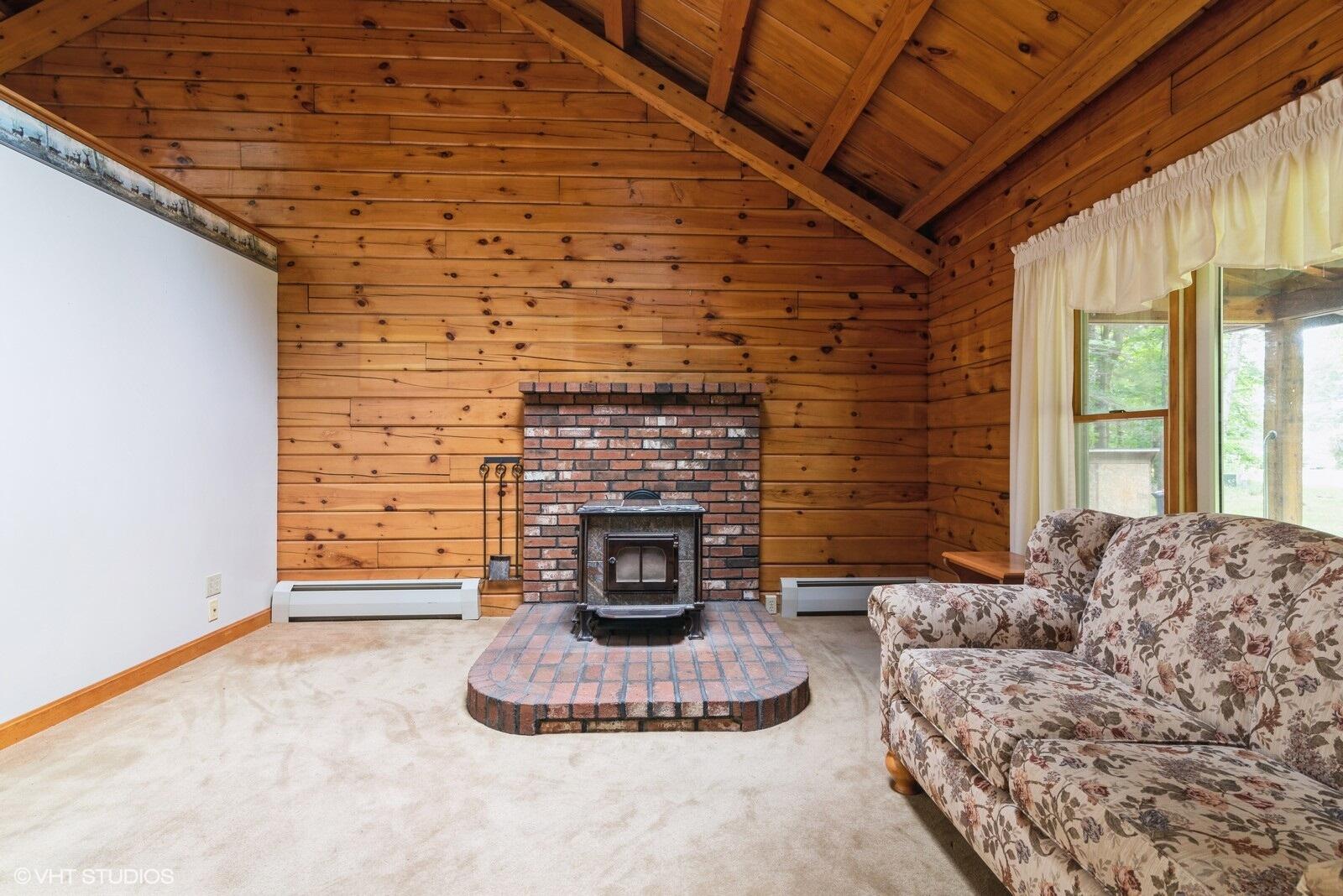 650 Ferry Road Saco, ME 04072 - Photo 6 of 38 Living room with wood stove