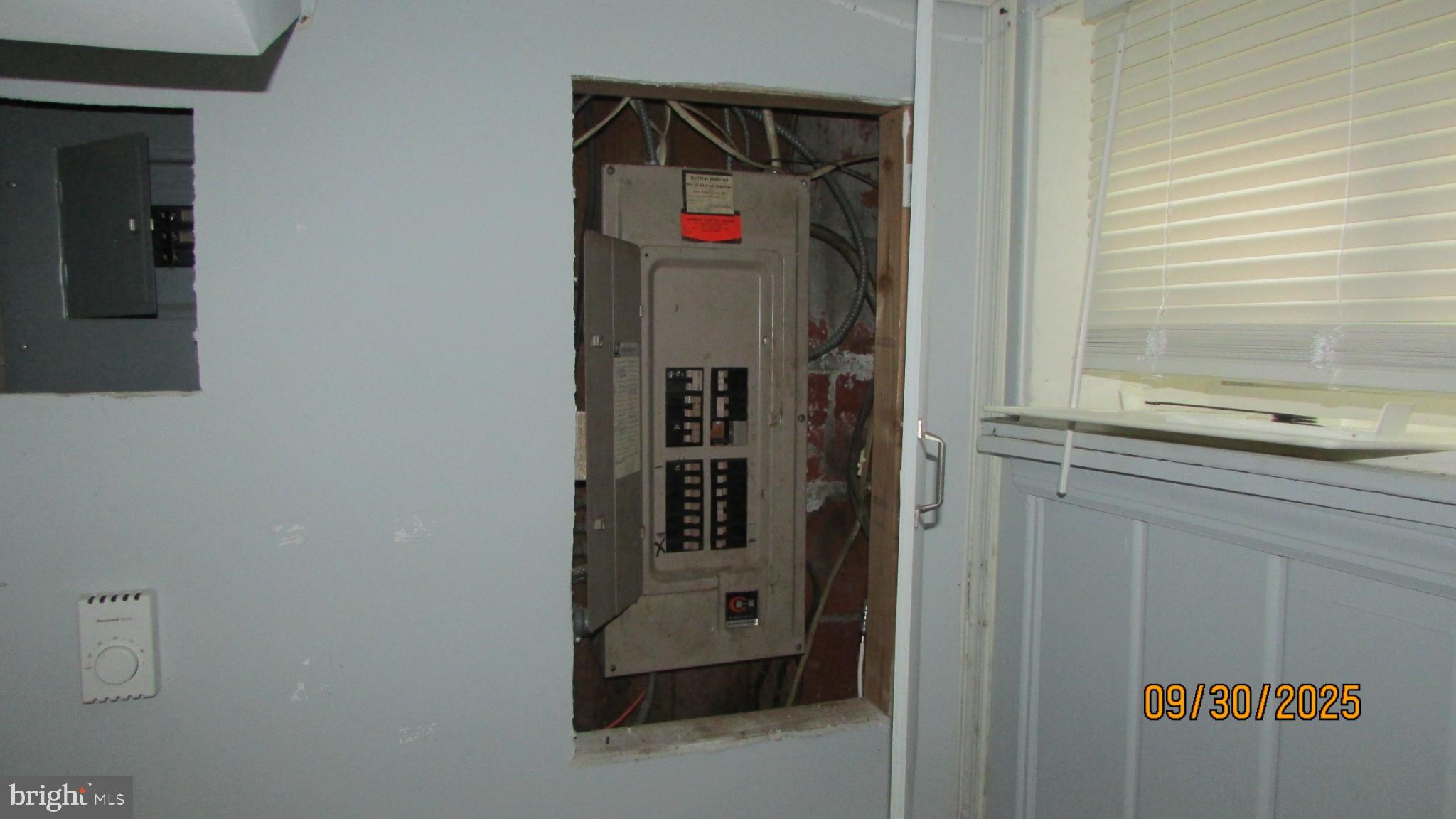 4501 Beechwood Road College Park, MD 20740 - Photo 28 of 57 Electrical panel access in a residential space.
