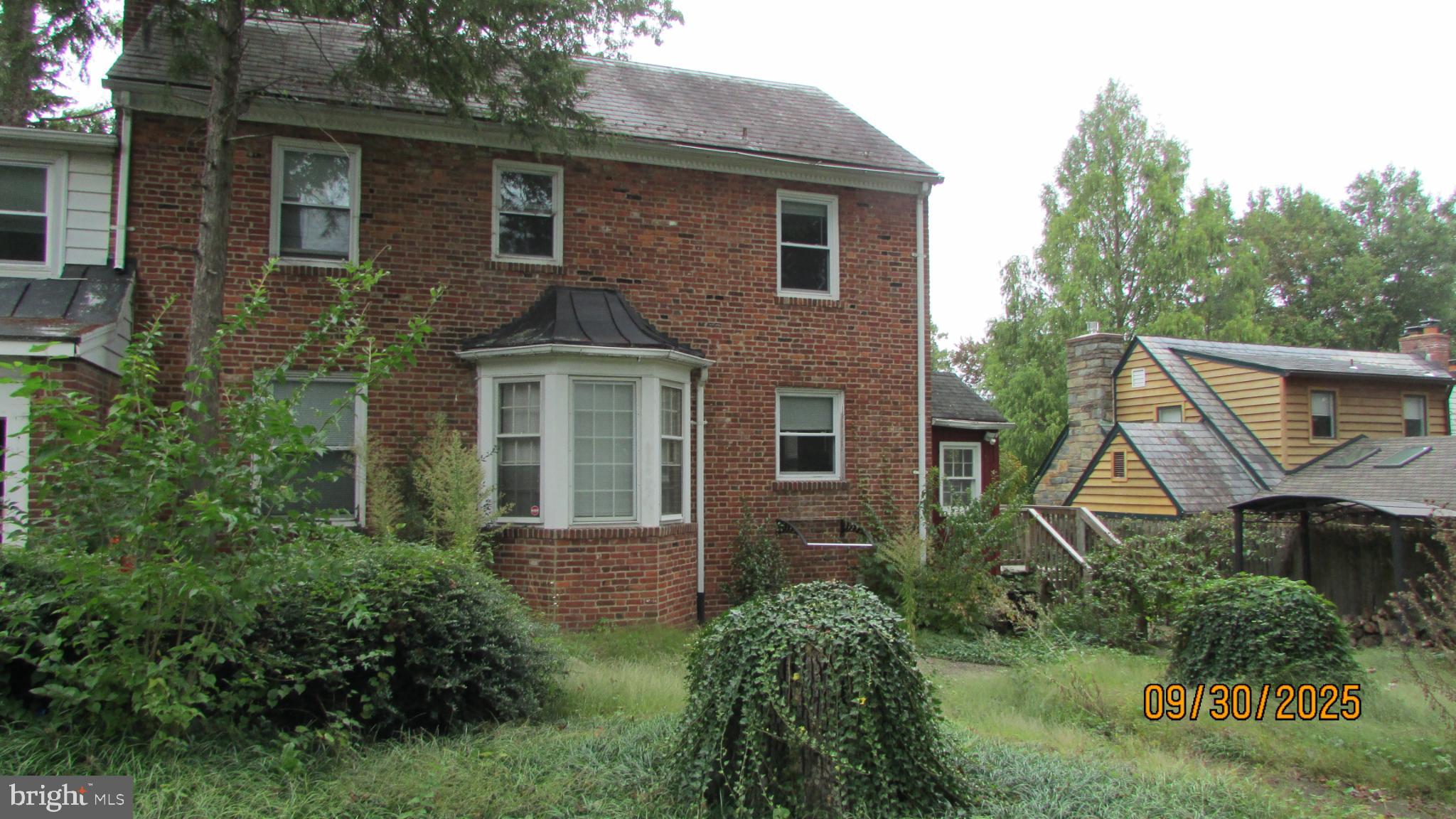 4501 Beechwood Road College Park, MD 20740 - Photo 4 of 57 a front view of a house with garden