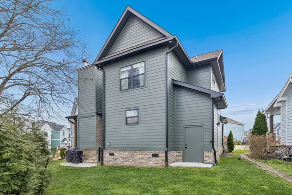 a backyard of a house with lots of green space