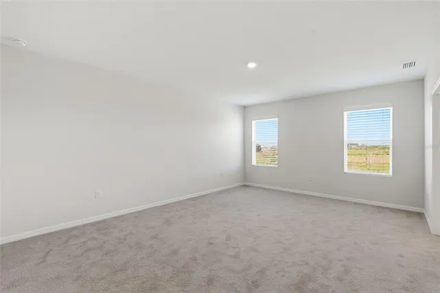 a bathroom with a bathtub and a sink