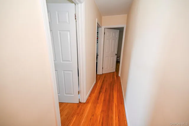 a room with furniture and wooden floor