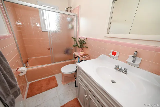 a terrace of a house with outdoor seating