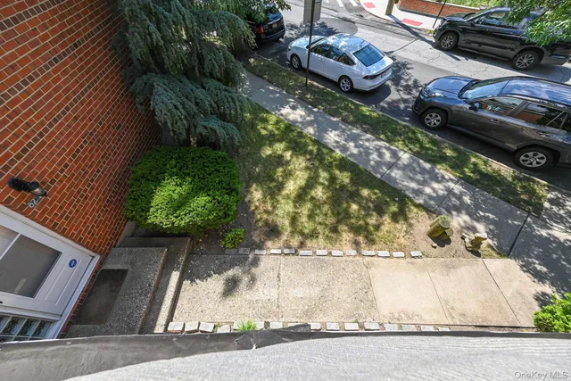 a view of a patio with table and chairs with wooden floor