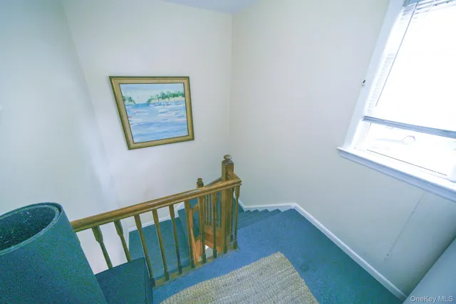 a view of swimming pool with seating area