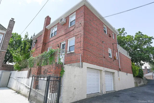 a view of a building with a street