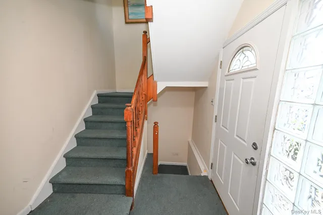 a view of an entryway with staircase