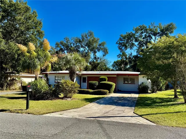 a view of house with outdoor space and porch