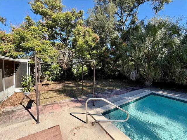 a view of a backyard with a patio