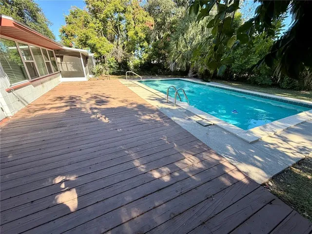 a view of backyard with wooden floor