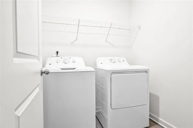 a utility room with dryer and washer