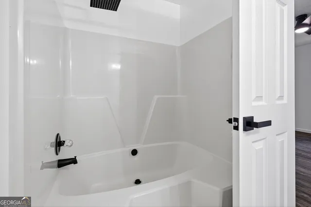 a bathroom with a bathtub
