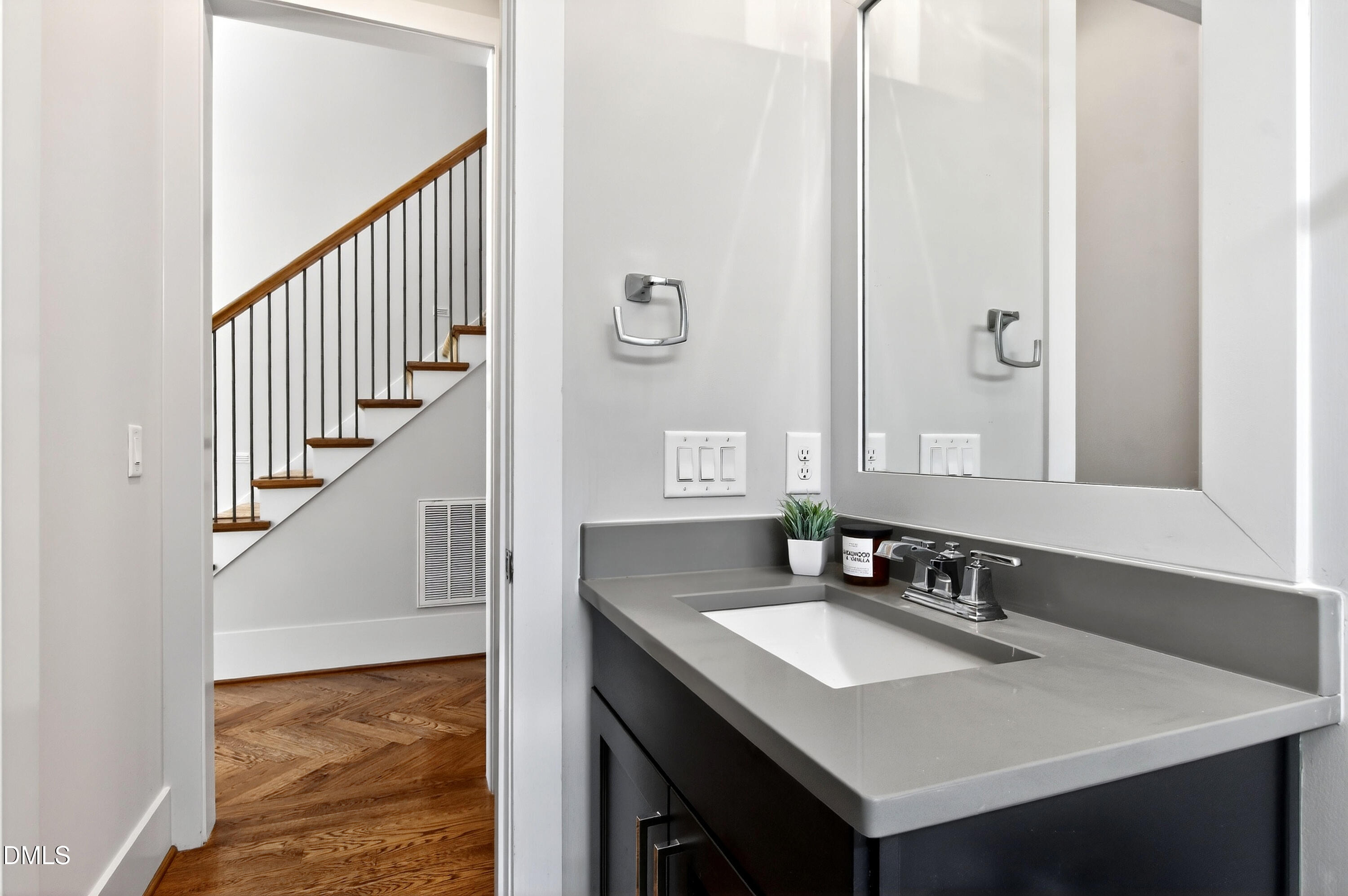 1116 Hymettus Court Raleigh, NC 27607 - Photo 10 of 69 a bathroom with a sink and a mirror