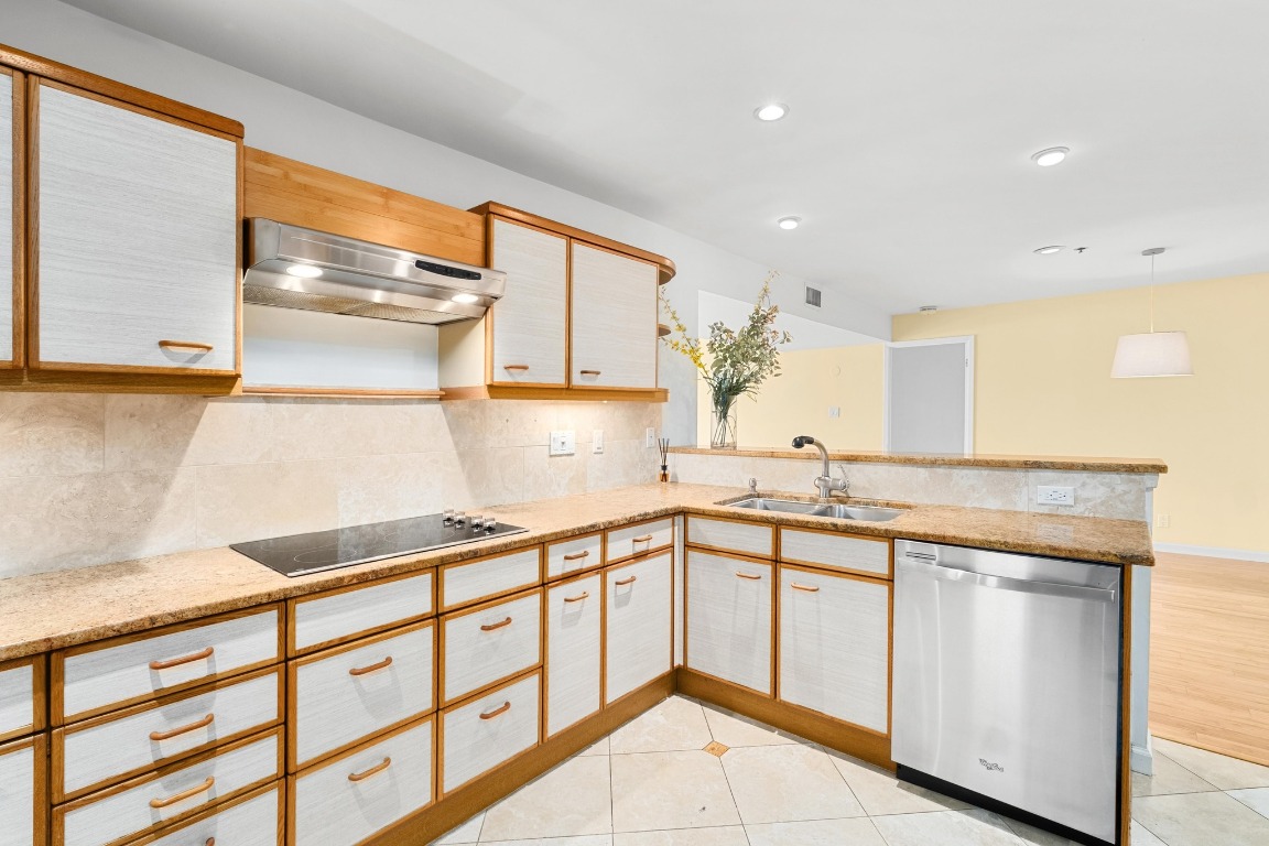 40 North Interstate Highway 35, Unit 3D3 Austin, TX 78701 - Photo 12 of 38 a kitchen with a sink cabinets and window