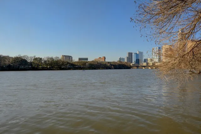a view of a lake with a house