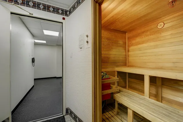 a view of a hallway with workspace