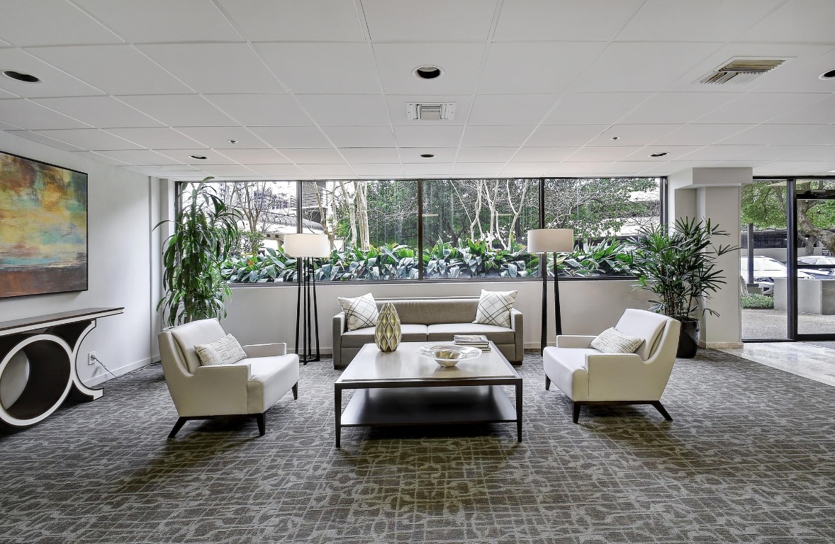 40 North Interstate Highway 35, Unit 3D3 Austin, TX 78701 - Photo 37 of 38 a living room with furniture and a floor to ceiling window