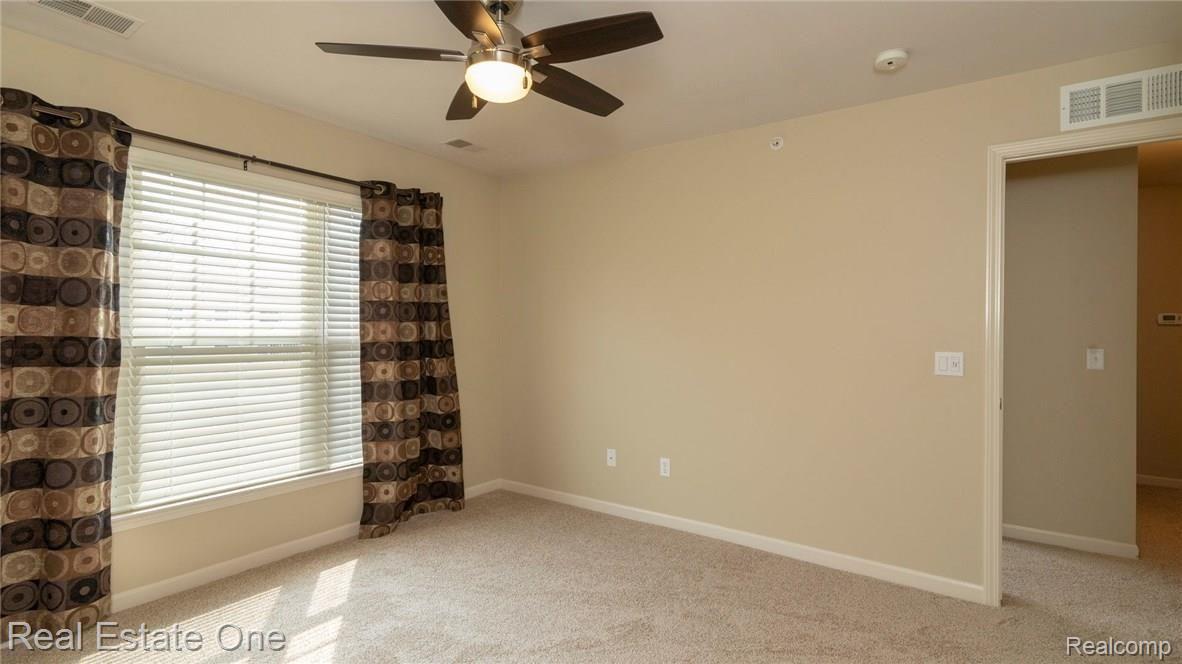 258 North Wixom Road, Unit 59 Wixom, MI 48393 - Photo 14 of 18 Master BR.jpg