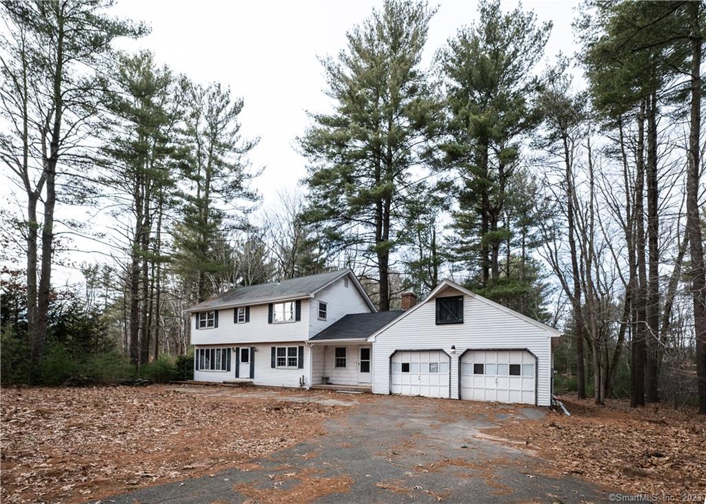 155 Homestead Drive South Glastonbury, CT 06073 - Photo 1 of 14 a house that has a tree in front of it