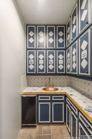 a view of an empty room with a balcony