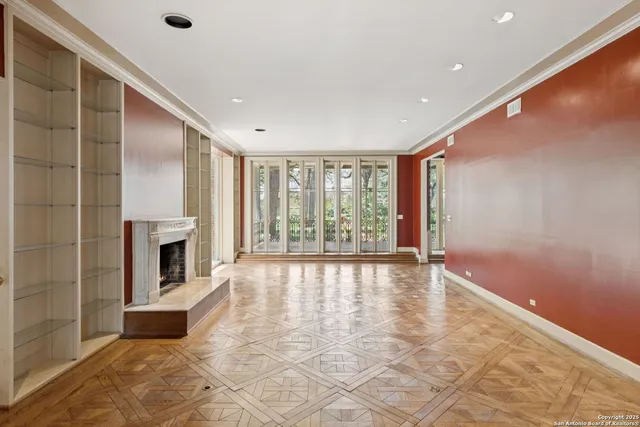 a kitchen with stainless steel appliances granite countertop a stove sink and cabinets