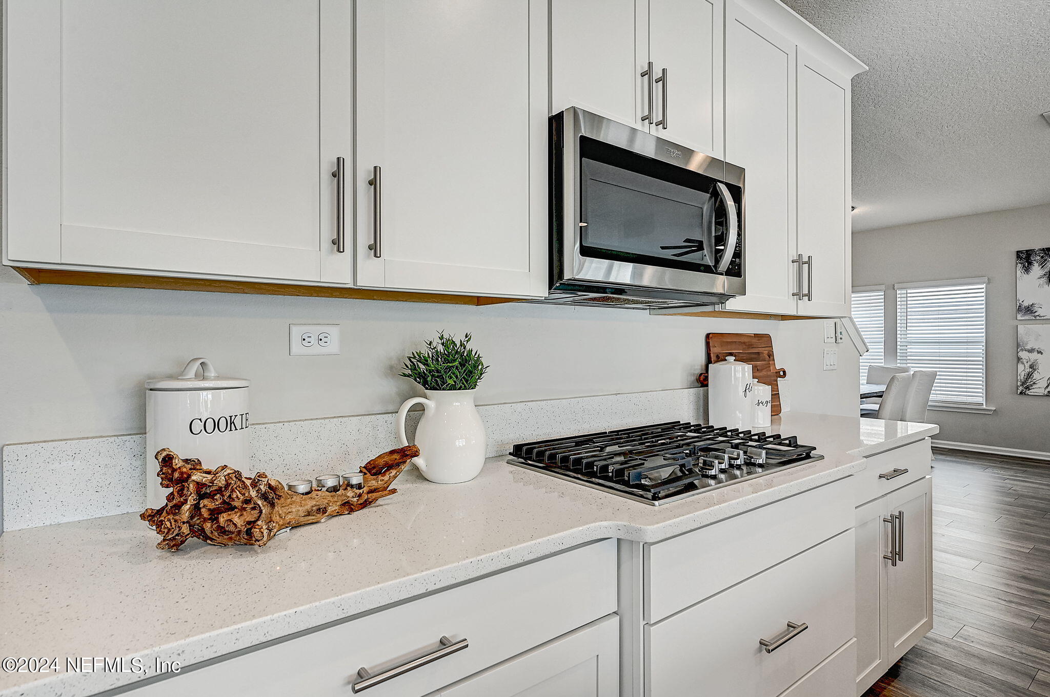 433 Watervale Drive St. Augustine, FL 32092 - Photo 14 of 66 a kitchen with a stove and a microwave