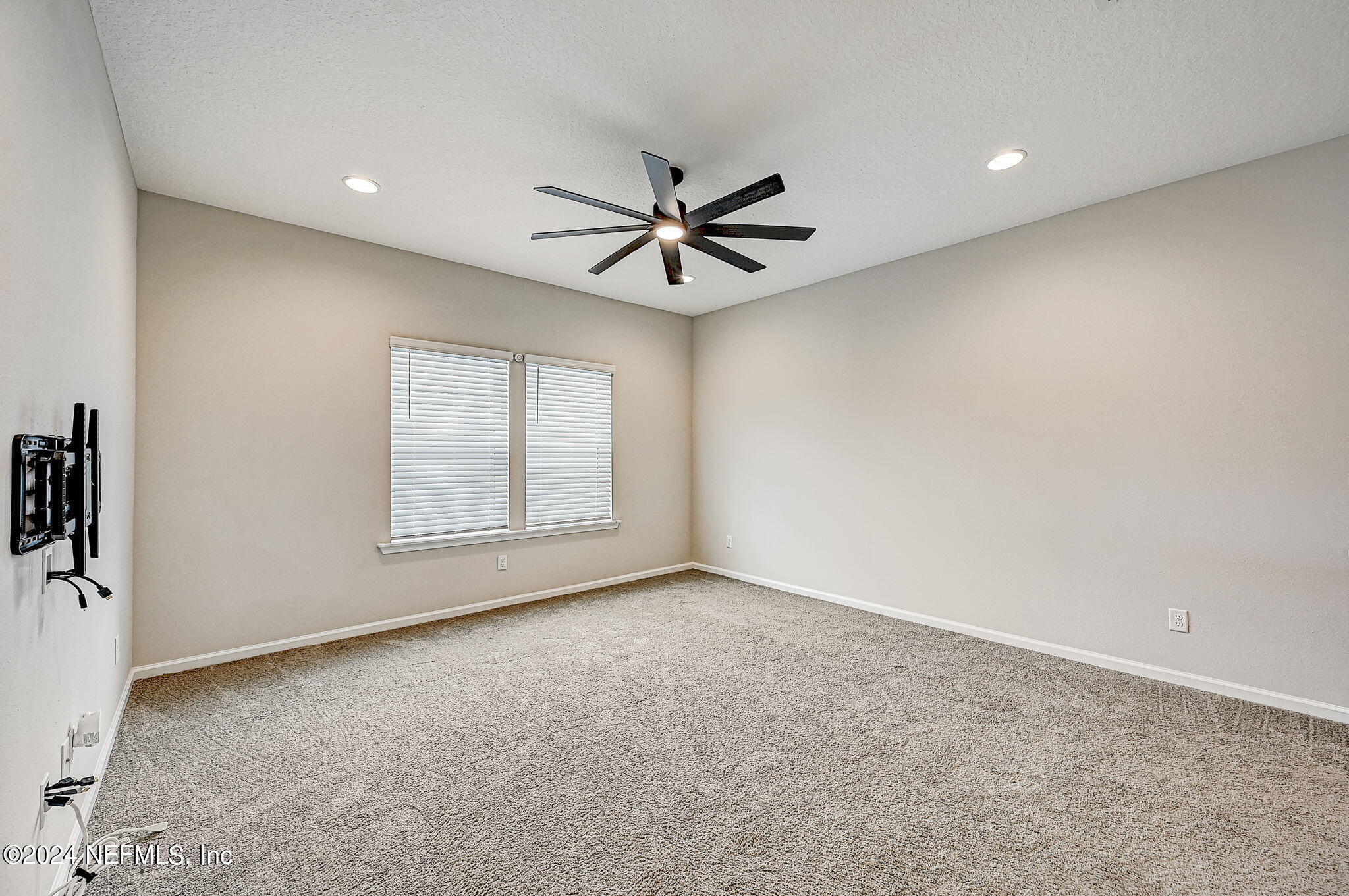 433 Watervale Drive St. Augustine, FL 32092 - Photo 25 of 66 an empty room with windows and fan
