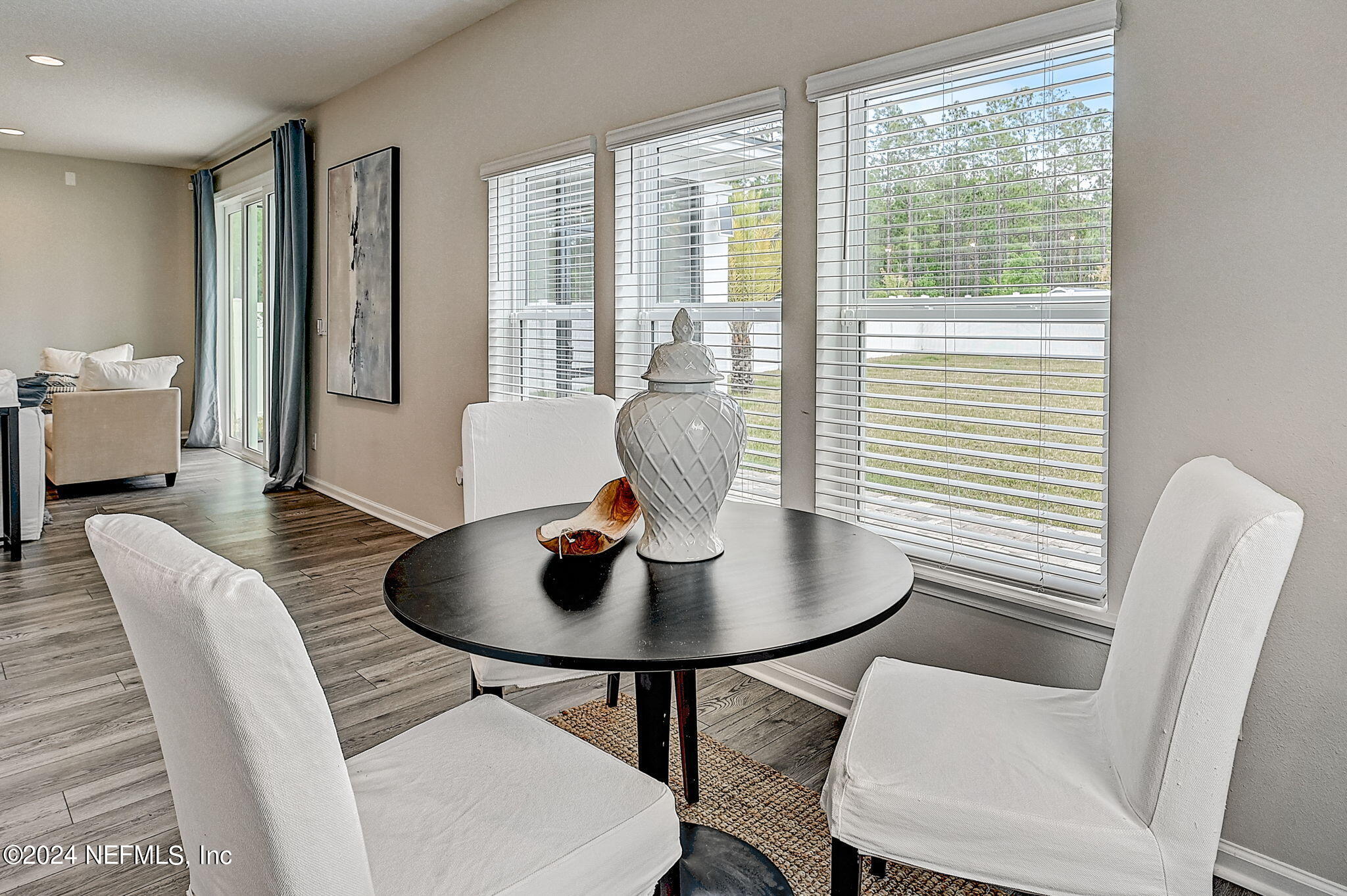 433 Watervale Drive St. Augustine, FL 32092 - Photo 3 of 66 a dining room with furniture and wooden floor
