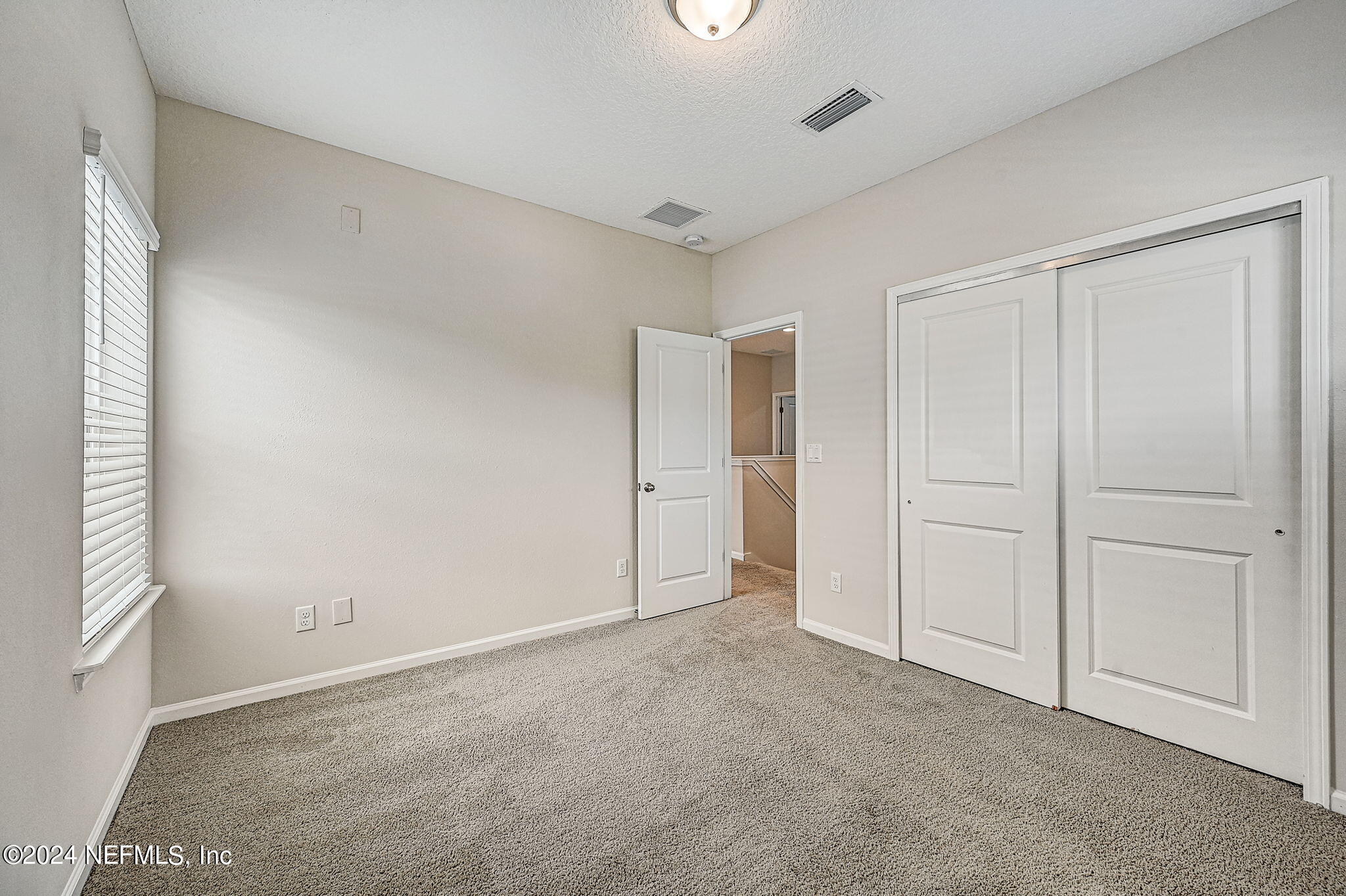 433 Watervale Drive St. Augustine, FL 32092 - Photo 35 of 66 a view of an empty room and closet area