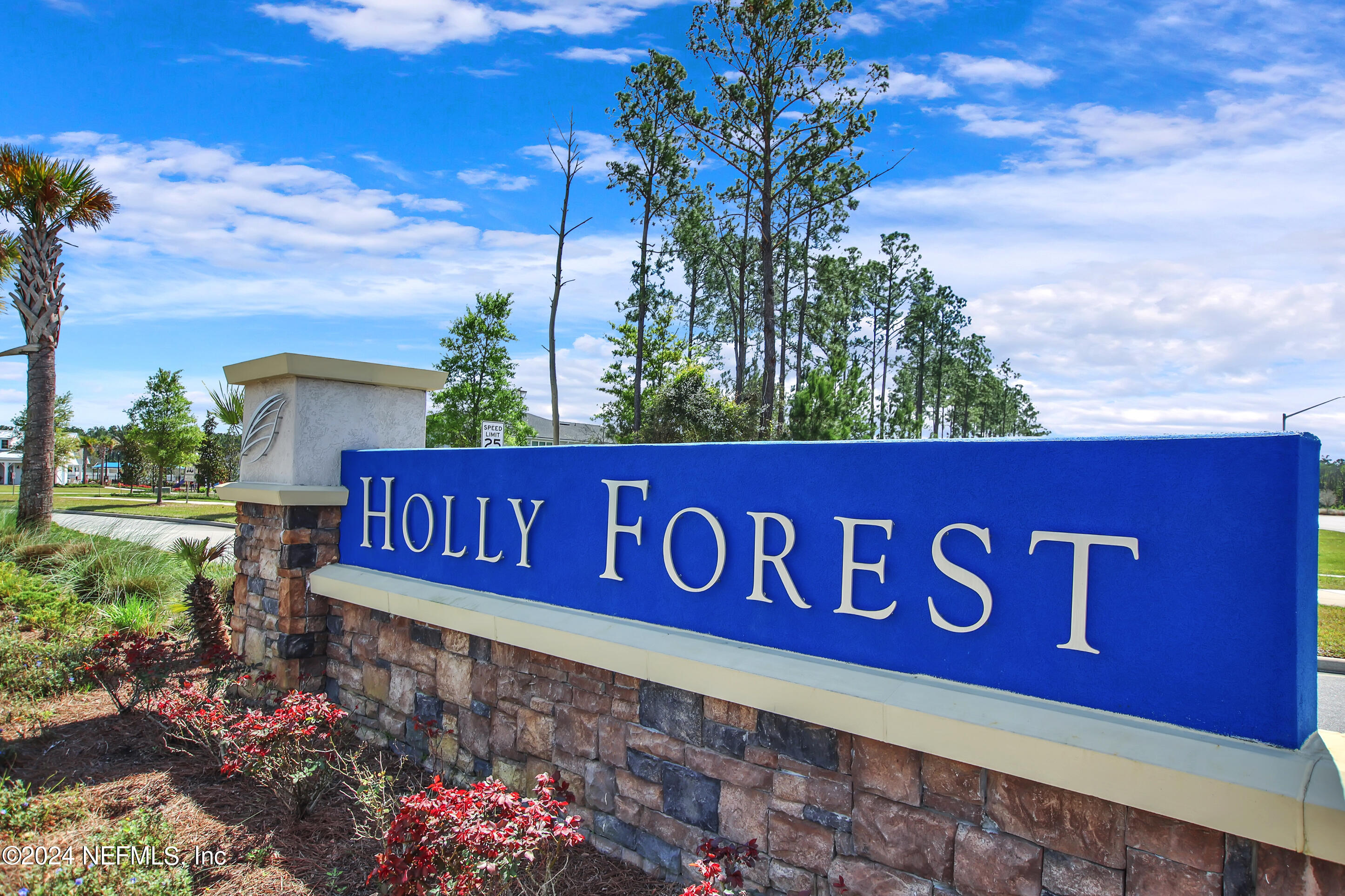 433 Watervale Drive St. Augustine, FL 32092 - Photo 53 of 66 a sign that is sitting in front of flowers