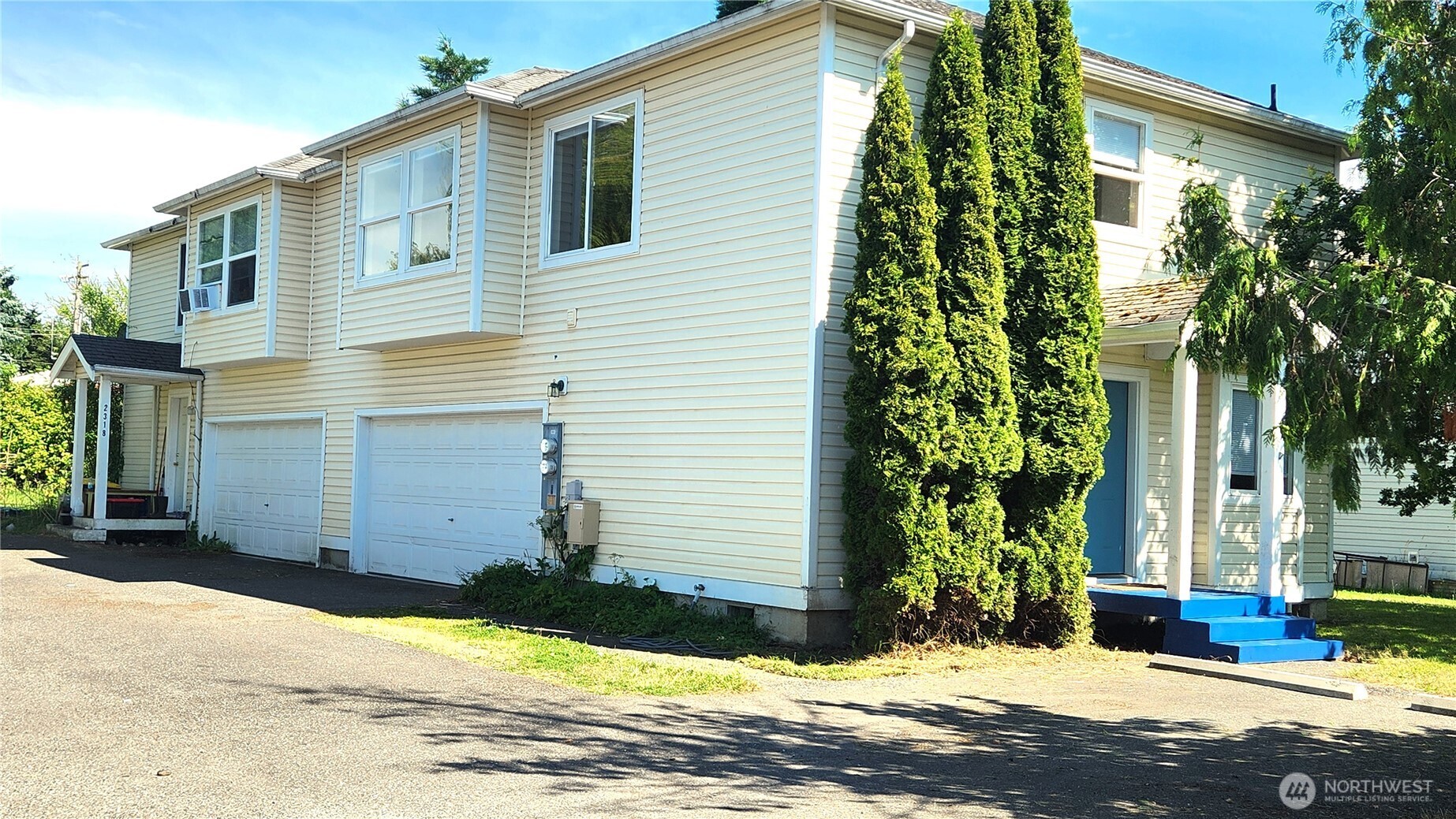 2316 Xenia Street, Unit 2316 Bellingham, WA 98229 - Photo 21 of 23 a view of a house with a yard and potted plants