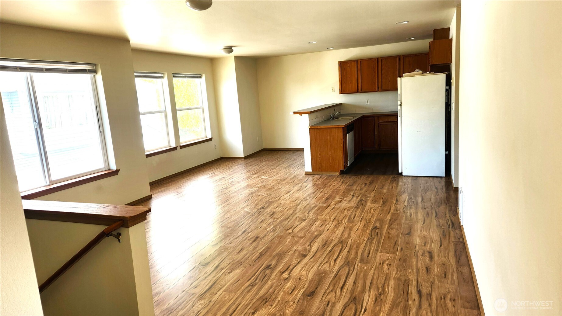 2316 Xenia Street, Unit 2316 Bellingham, WA 98229 - Photo 3 of 23 a view of empty room with wooden floor and fan