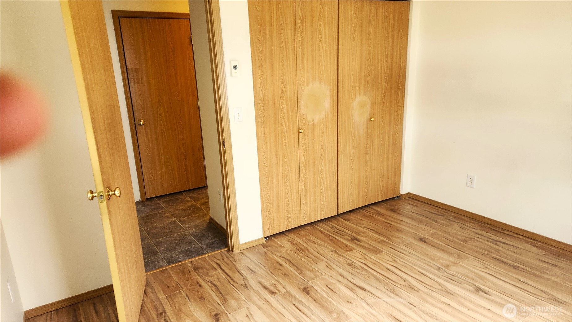 2316 Xenia Street, Unit 2316 Bellingham, WA 98229 - Photo 8 of 23 a view of a hallway with wooden floor