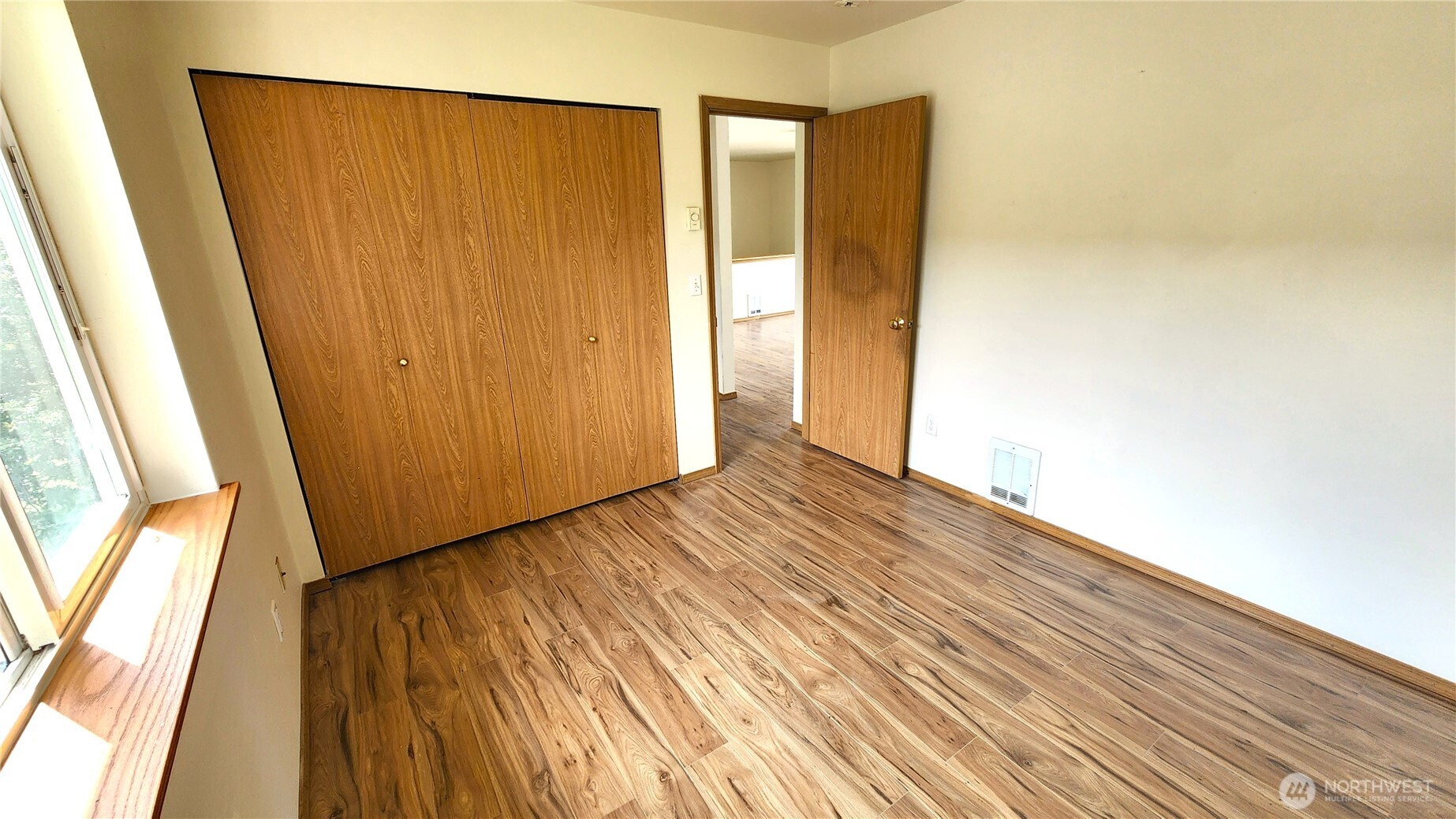 2316 Xenia Street, Unit 2316 Bellingham, WA 98229 - Photo 9 of 23 a view of wooden floor in an empty room