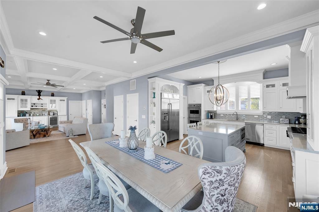 6 Capstan Road Waretown, NJ 08758 - Photo 14 of 47 a living room with furniture and kitchen view