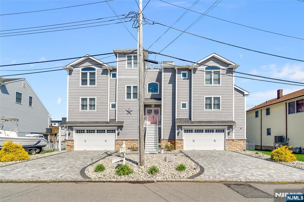 6 Capstan Road Waretown, NJ 08758 - Photo 3 of 47 a front view of a house with a outdoor space